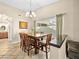 Cozy dining area with a chandelier and natural light, ideal for Gathering meals and gatherings at 2212 Marble Gorge Dr, Las Vegas, NV 89117