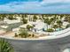 Beautiful exterior view of home featuring a well maintained lawn and circular driveway at 2212 Marble Gorge Dr, Las Vegas, NV 89117