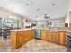 Modern kitchen with a large island, stainless steel appliances, and stylish countertops at 2212 Marble Gorge Dr, Las Vegas, NV 89117
