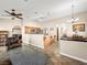 Open-concept living space with a kitchen, dining area, and living room, perfect for modern living at 2212 Marble Gorge Dr, Las Vegas, NV 89117