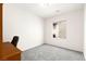 Empty bedroom features gray carpet and window at 3528 Tack St, Las Vegas, NV 89122