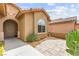 Inviting front entrance with a well-maintained walkway and desert landscaping showcasing curb appeal at 3528 Tack St, Las Vegas, NV 89122