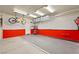Garage with well-organized storage solutions, and a bike hanging on the wall at 3528 Tack St, Las Vegas, NV 89122