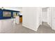 Hallway leads to a living space and bathroom with neutral tones, offering seamless transitions at 3528 Tack St, Las Vegas, NV 89122