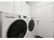 A bright laundry room with a LG washer and dryer set at 3528 Tack St, Las Vegas, NV 89122