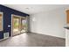 Bright living room with a sliding glass door and view into the backyard at 3528 Tack St, Las Vegas, NV 89122