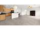 Open concept living space with kitchen, breakfast bar, and Gathering room at 3528 Tack St, Las Vegas, NV 89122
