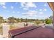 Enjoy community and golf course views from the balcony with a luxurious hot tub at 5492 Royal Vista Ln, Las Vegas, NV 89149