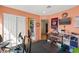 The spacious exercise room includes workout equipment, a desk, and a closet, offering a versatile space at 5492 Royal Vista Ln, Las Vegas, NV 89149