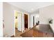 Hallway with built in cabinets, doors to the laundry room, closet and bedroom at 5492 Royal Vista Ln, Las Vegas, NV 89149