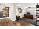 Office features include a bookshelf, natural light, and a ceiling fan at 5492 Royal Vista Ln, Las Vegas, NV 89149