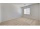 This bright bedroom has neutral carpet and great natural light at 6267 Dollar Bill Ct, Las Vegas, NV 89141