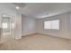 Spacious bonus room with neutral carpet and abundant natural light from the window at 6267 Dollar Bill Ct, Las Vegas, NV 89141
