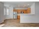 Modern kitchen with stainless steel appliances and oak cabinetry at 6267 Dollar Bill Ct, Las Vegas, NV 89141