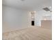 Open loft area with neutral carpet, recessed lighting, and an open concept layout at 6267 Dollar Bill Ct, Las Vegas, NV 89141