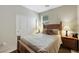 Comfortable bedroom featuring a full bed, a sliding door closet, and neutral tones at 703 Shiva St, Las Vegas, NV 89178