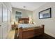 Comfortable bedroom featuring a full bed, a sliding door closet, and neutral tones at 703 Shiva St, Las Vegas, NV 89178