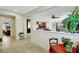 Open-concept entryway showcasing views of the kitchen, living, and dining areas, enhancing the home's flow at 703 Shiva St, Las Vegas, NV 89178