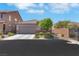 Charming single-story home featuring a well-maintained yard and attached two-car garage at 703 Shiva St, Las Vegas, NV 89178
