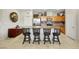 Stylish kitchen with granite countertops, wood cabinets, and stainless steel appliances at 703 Shiva St, Las Vegas, NV 89178