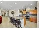 Modern kitchen with an island breakfast bar and stainless steel appliances at 703 Shiva St, Las Vegas, NV 89178