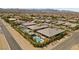 Aerial view of a home featuring a backyard with a pool, spa, and outdoor kitchen at 7477 Triple Knot Ct, Las Vegas, NV 89113