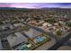Breathtaking aerial view of the property showcasing its expansive lot, pool, landscaping, and neighborhood at 7477 Triple Knot Ct, Las Vegas, NV 89113