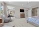 Spacious bedroom with a sitting area, providing a relaxing and private retreat within the home at 7477 Triple Knot Ct, Las Vegas, NV 89113