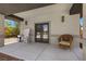 Relaxing patio area with comfortable seating, perfect for enjoying the outdoors by the pool at 7477 Triple Knot Ct, Las Vegas, NV 89113