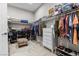 Organized walk-in closet with shelving, hanging rods, and storage bins, providing ample storage space at 7477 Triple Knot Ct, Las Vegas, NV 89113