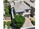 Charming two-story home with a brick driveway, lush landscaping, and well-maintained roof tiles at 7788 Ebro Valley Ct, Las Vegas, NV 89113