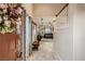 Welcoming entryway with tile floors, leading to the living area, and a staircase visible at 7788 Ebro Valley Ct, Las Vegas, NV 89113