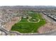 An aerial view of a lush community park, offering walking paths, green spaces and recreational amenities for residents at 789 Goodman Cove St, Henderson, NV 89011
