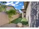 Back yard features gravel, small yard, artificial turf, and access to the covered patio at 789 Goodman Cove St, Henderson, NV 89011