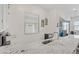 Wet bar area with granite countertop and stainless-steel sink at 789 Goodman Cove St, Henderson, NV 89011