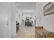Home's entryway leads to the dining area and showcases a glimpse of the living space at 789 Goodman Cove St, Henderson, NV 89011