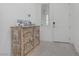 Comfortable entryway featuring decorative furniture and tile floors at 789 Goodman Cove St, Henderson, NV 89011