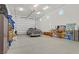 Large garage space with storage, bright lighting and space for multiple vehicles at 789 Goodman Cove St, Henderson, NV 89011