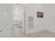 Bright laundry room features washer, dryer, and white cabinets at 789 Goodman Cove St, Henderson, NV 89011