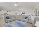 Spacious living room with modern finishes and an open layout leading to dining area at 789 Goodman Cove St, Henderson, NV 89011