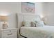Cozy main bedroom featuring a comfortable bed, stylish nightstands, and tasteful decor at 789 Goodman Cove St, Henderson, NV 89011
