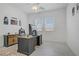 The office has gray plank flooring, a ceiling fan, and a window for natural light at 789 Goodman Cove St, Henderson, NV 89011