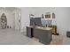 Office space with gray plank flooring, large desk, and modern decor for a productive work environment at 789 Goodman Cove St, Henderson, NV 89011