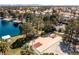 Aerial view highlighting lake, basketball court and community amenities at 8109 Moonstone Cir, Las Vegas, NV 89128