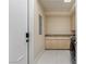 Laundry room with neutral cabinets and countertops at 8109 Moonstone Cir, Las Vegas, NV 89128