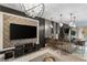 Chic living area with modern decor, media setup, and a stylish bar area at 8109 Moonstone Cir, Las Vegas, NV 89128