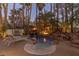 Beautiful backyard pool and spa with a waterfall feature and tropical landscaping at 8109 Moonstone Cir, Las Vegas, NV 89128