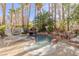 Serene pool area with a waterfall, lounge chairs, and plenty of space for relaxation at 8109 Moonstone Cir, Las Vegas, NV 89128
