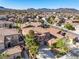 Two-story home with well-maintained landscaping and tile roof in a suburban neighborhood at 853 Ashford Way, Henderson, NV 89015
