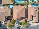 Aerial view of the neighborhood, showcasing a two story home and other residences at 853 Ashford Way, Henderson, NV 89015